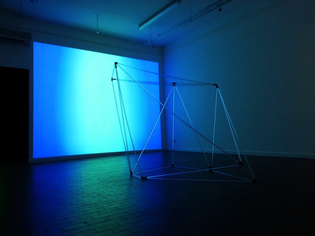 Anne Katrine Senstad, The Venice Biennale installation view. Exhibition title: Metamorphosis of the Virtual. Sculptural piece titled Universals, projection of video piece Color Synesthesia, Silent version. 60 min DV.